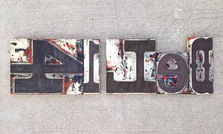 del14 woodblock letters